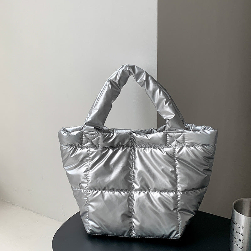 Korean version of trendy down bag women's niche design autumn and winter simple high-end handbag hand carry cotton clothing bag