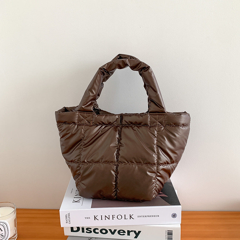 Korean version of trendy down bag women's niche design autumn and winter simple high-end handbag hand carry cotton clothing bag